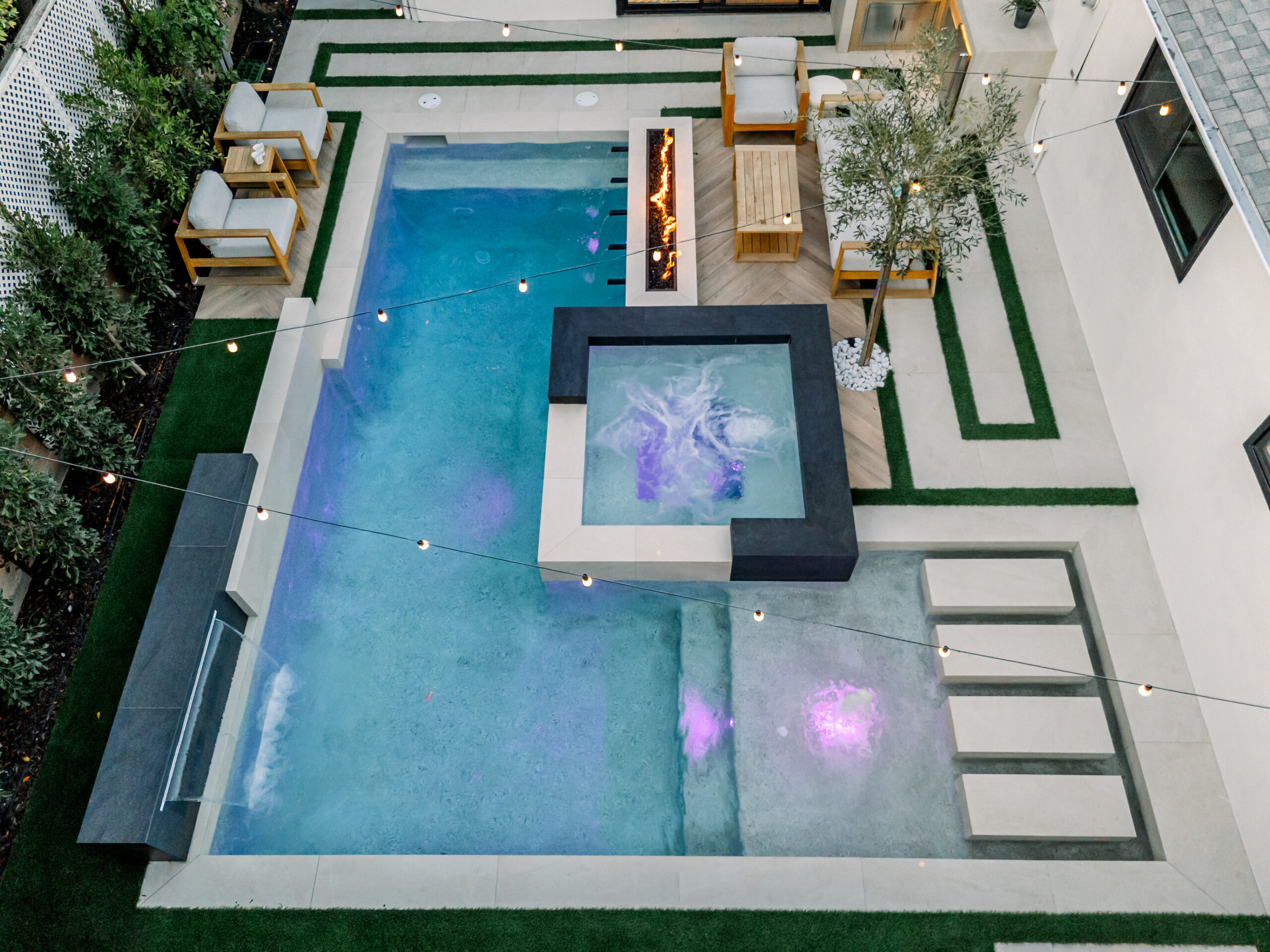 Aerial view of newly completed backyard pool construction, Orange County, CA